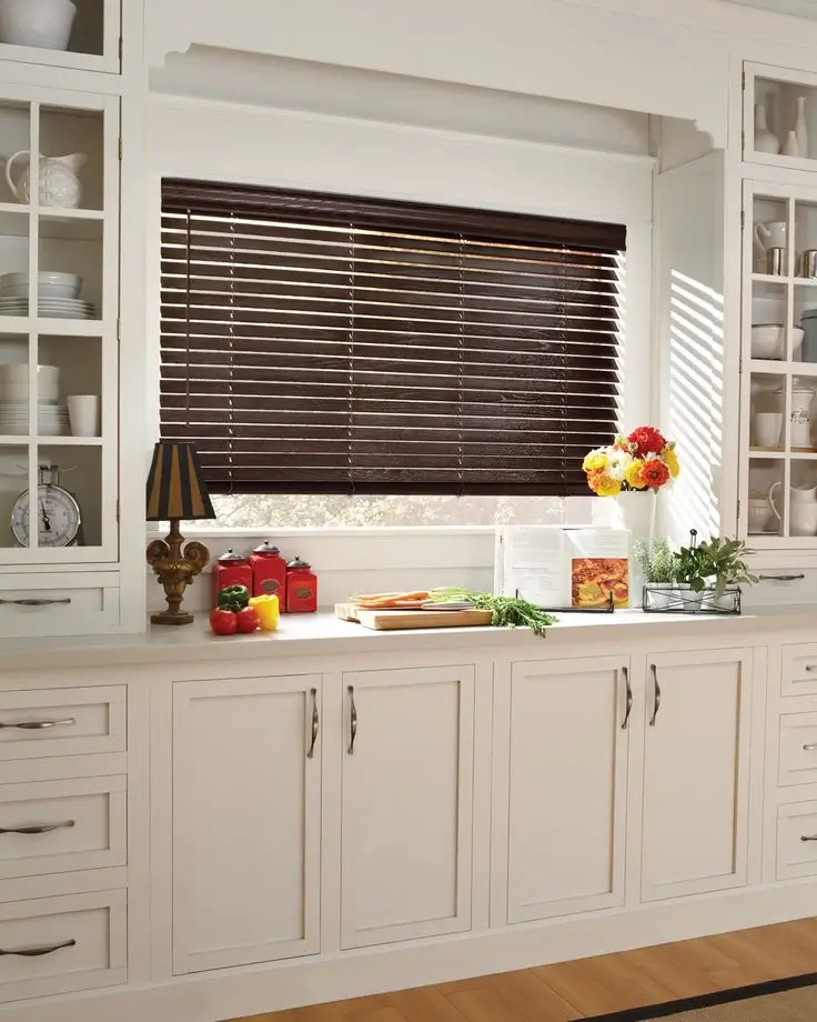 Clean and modern kitchen with white blinds