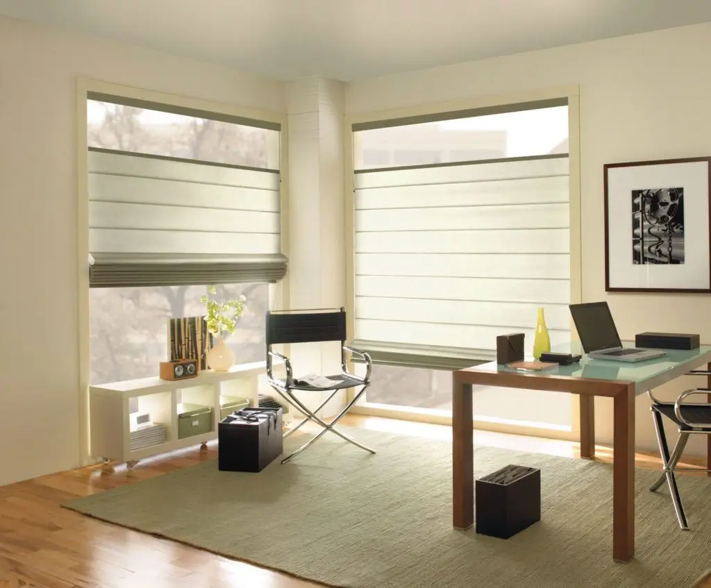 Home office with wooden blinds providing controlled light