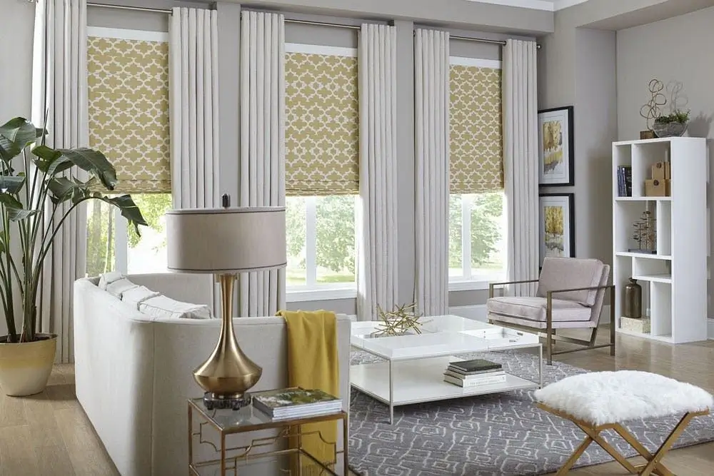 Elegant living room with beautifully folded roman shades