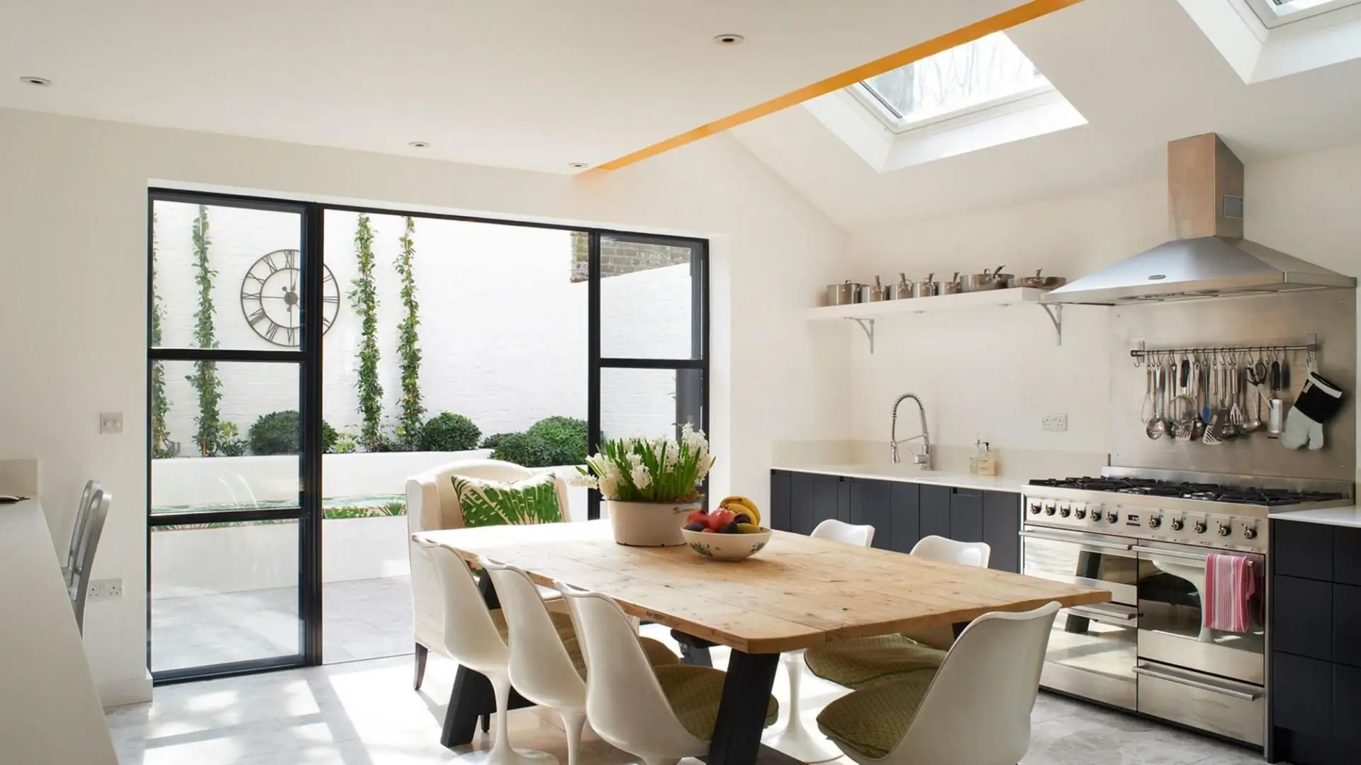 Bright kitchen dining area with energy-efficient cellular shades