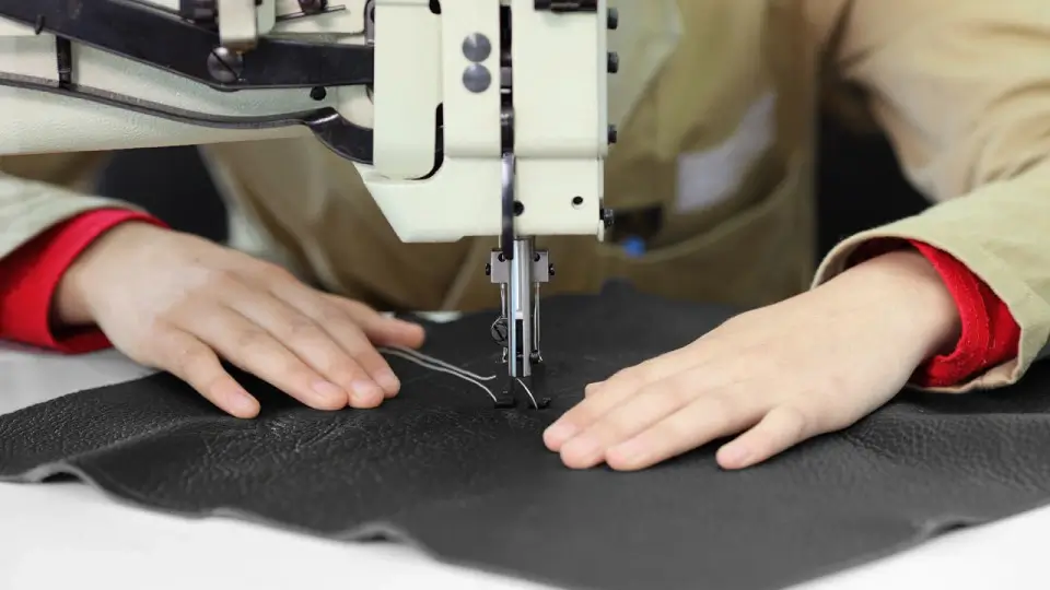 Artisan sewing machine working on high-quality fabric